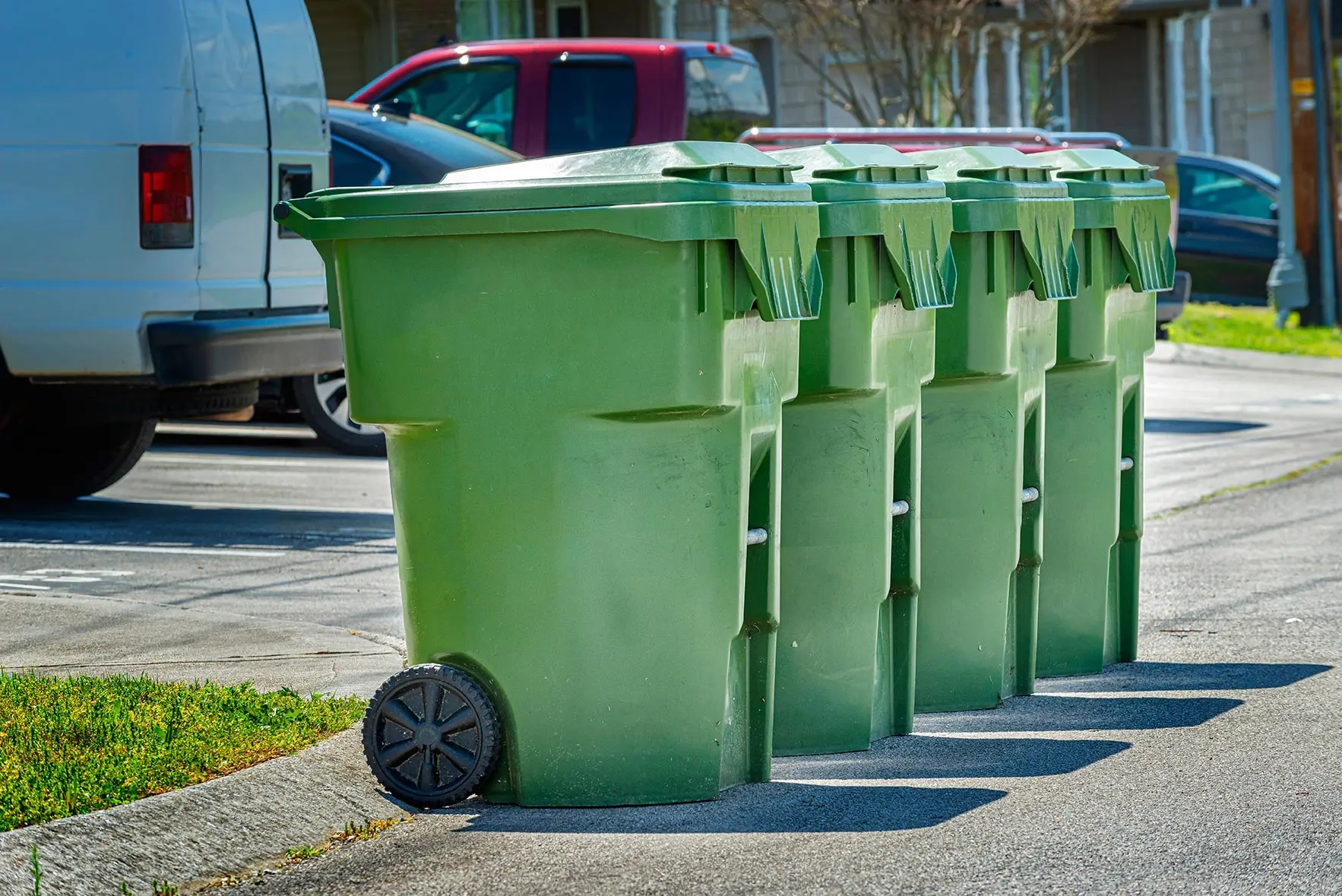 Waste collection bins ready for collection